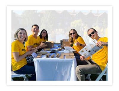 Stryker employees work to build native bee houses to support local bee populations