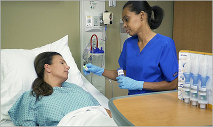 Nurse helping patient with Sage oral care to help prevent pneumonia