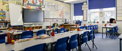 Empty classroom at an elementary school needing an AED 