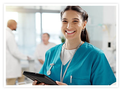 Nurse holding a tablet in a hospital setting