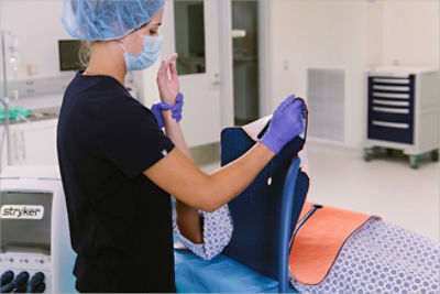 Nurse applying the Altrix non-gel-adhesive wraps reducing gaps and enhancing thermal transfer