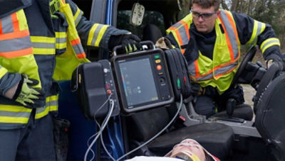 two emergency technicians treating patient using LIFEPAK 35 monitor/defibrillator