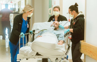 CCNs tend to a patient in the Emergency Department 