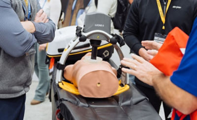 A demonstration of the LUCAS v3, 3.1 on a dummy to an audience at the EMS World Trade Show