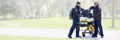 EMTs transporting a Power-Pro 2, LUCAS device and LIFEPAK 35 monitor/defibrillator