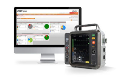 LIFEPAK 35 unit in front of monitor displaying LIFENET System screen