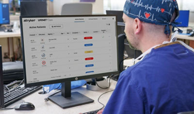 Nurse reviewing LIFENET Care data in the emergency department 