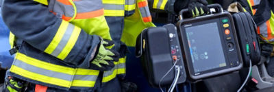 First responders passing LIFEPAK 35 through a car crash