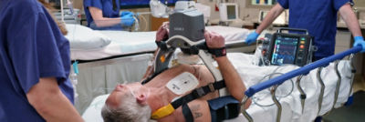 Cardiac patient being treated in the ED with a LIFEPAK 35 monitor and LUCAS v3,3.1 device on a Prime series stretcher