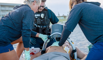 First responders using a LUCAS device and LIFEPAK CR2 AED on a cardiac arrest victim