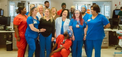 People learning CPR on a dummy