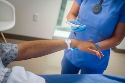 Nurse uses smartphone to collect patient information