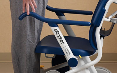 Close-up of the stand-assist armrests on Stryker's Prime TC Transport Chair