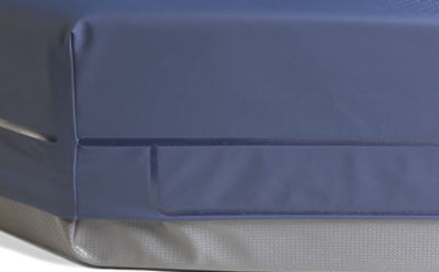 Hospital gel mattress cover includes welded seams 