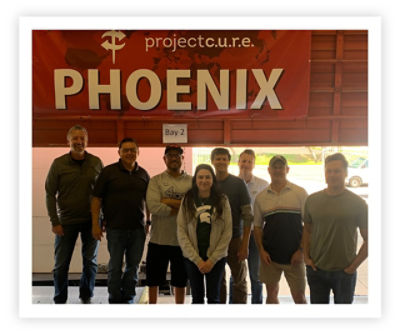 Stryker employees volunteering for Project CURE V2