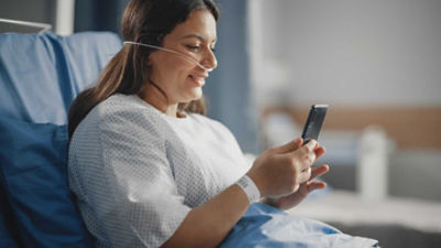 Female patient using ThriveLink to enroll directly into social and clinical programs.