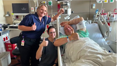 EMTs who saved his life visit Ron Baker in the hospital after his heart attack