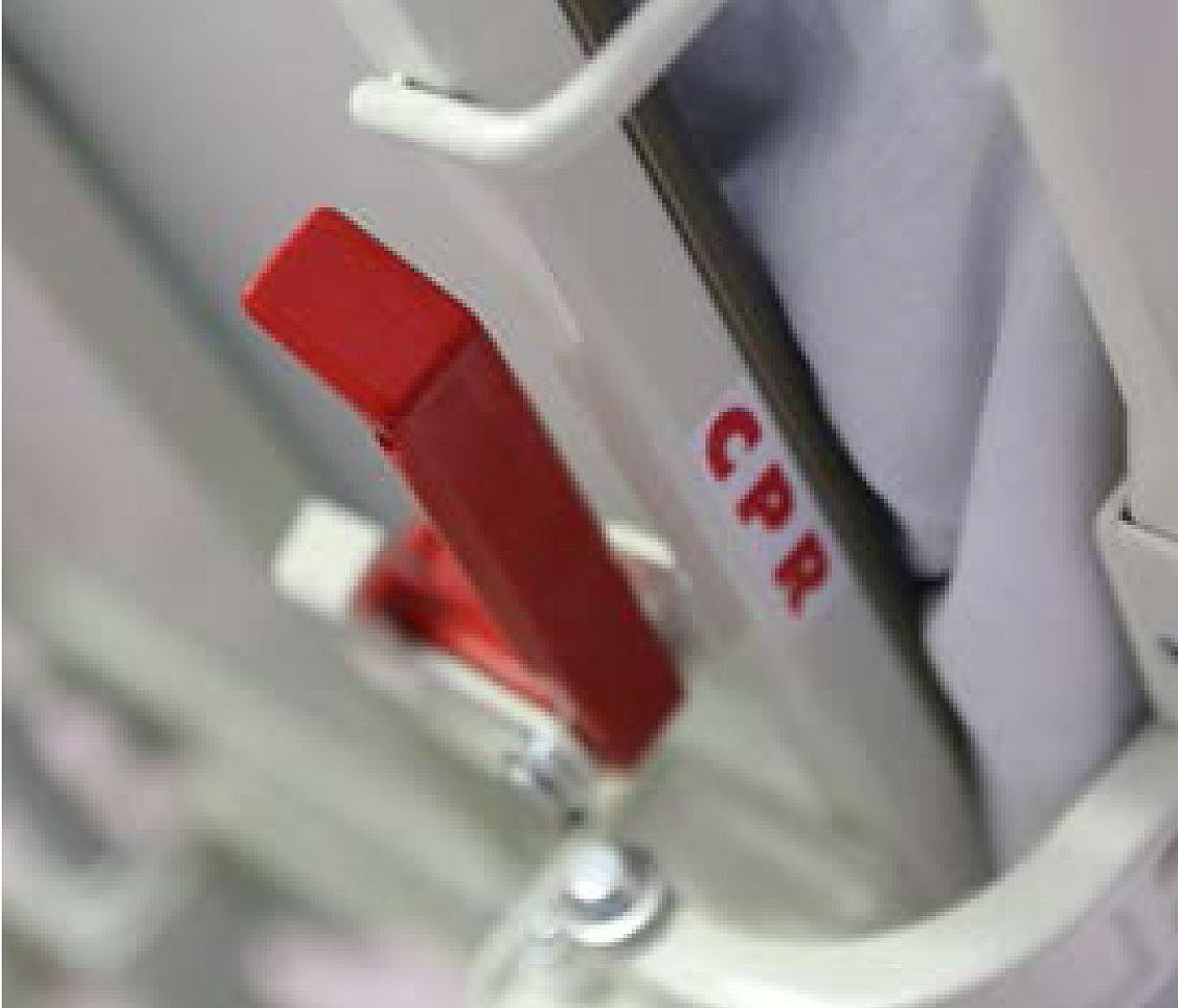 Close-up of the CPR levers on Stryker's SV2 hospital bed