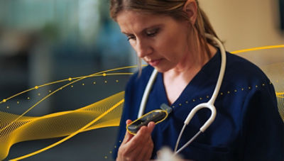 Healthcare professional using Sync Badge voice technology for clinical documentation