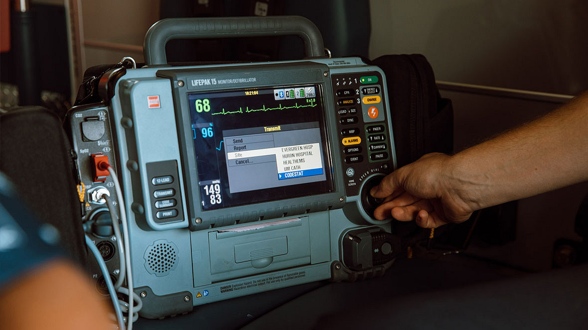 An EMT transmits a report to a hospital using the LIFEPAK 15 monitor/defibrillator 