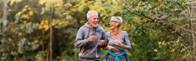 multigen-2-senior-couple-jogging-stock image