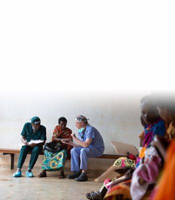 Doctors and nurses interacting with patient