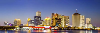 View of New Orleans skyline at night from the river