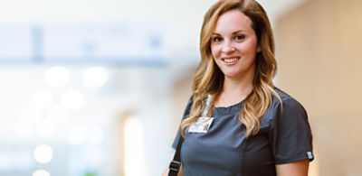 Nurse looking in hallway