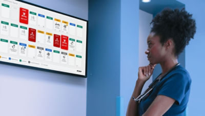 Nurse reviews Vision clinical dashboard 