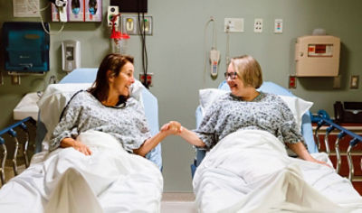 Patients in Stryker hospital beds 