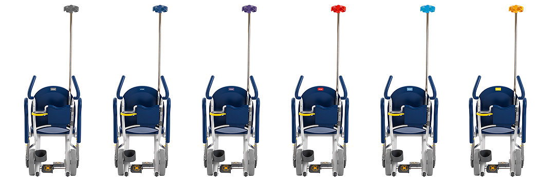 Row of six hospital patient transport wheelchairs 