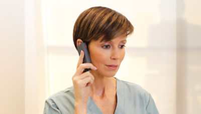 Nurse talking on Sync Badge