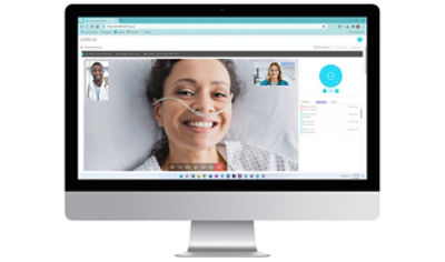 Patient on monitor in virtual care session with doctor and virtual nurse