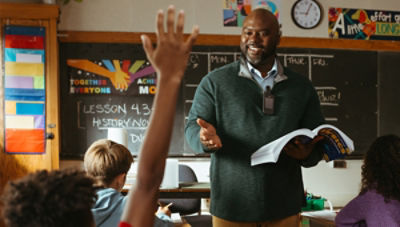 School teacher communicating with students